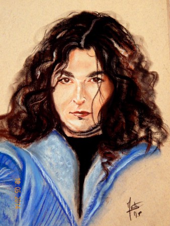 Yannick avec ses cheveux longs